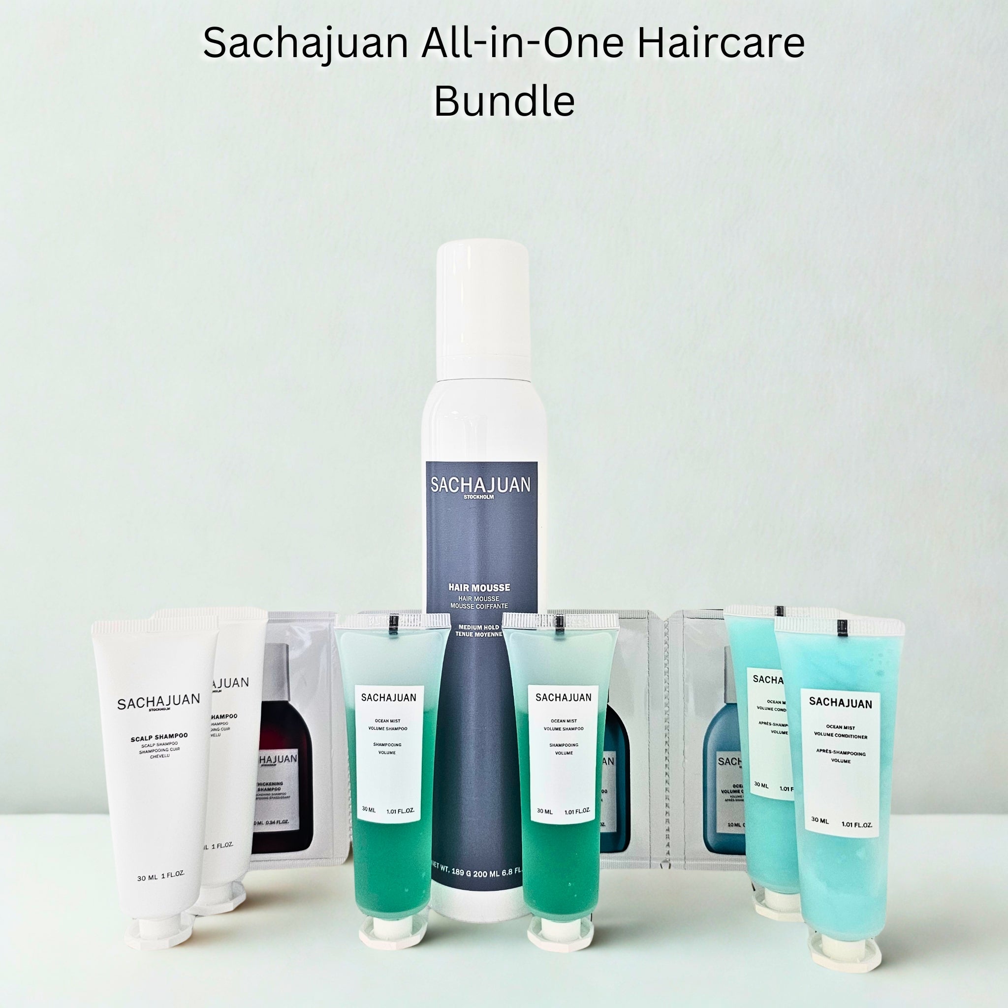 Sachajuan All-in-One Haircare Bundle with various hair care products on a light gray background - Available in Trnc