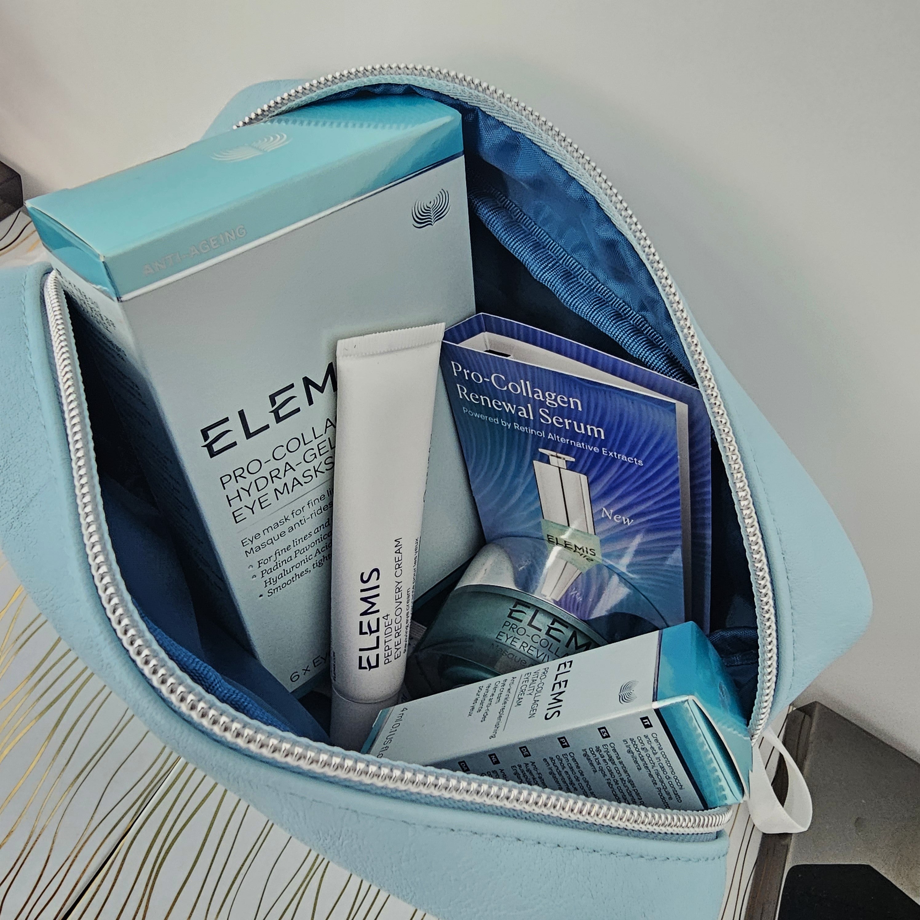 Open light blue makeup bag with Elemis skincare products inside, are available in cyprus and trnc.
