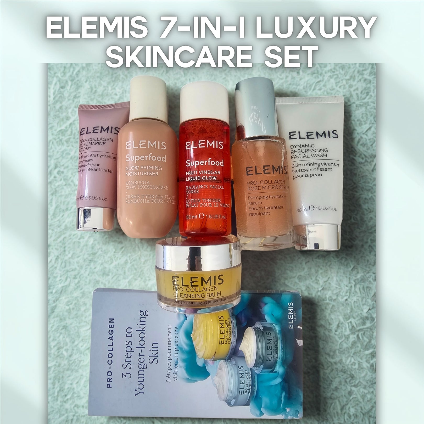 Elemis skincare set with various products on a textured background
