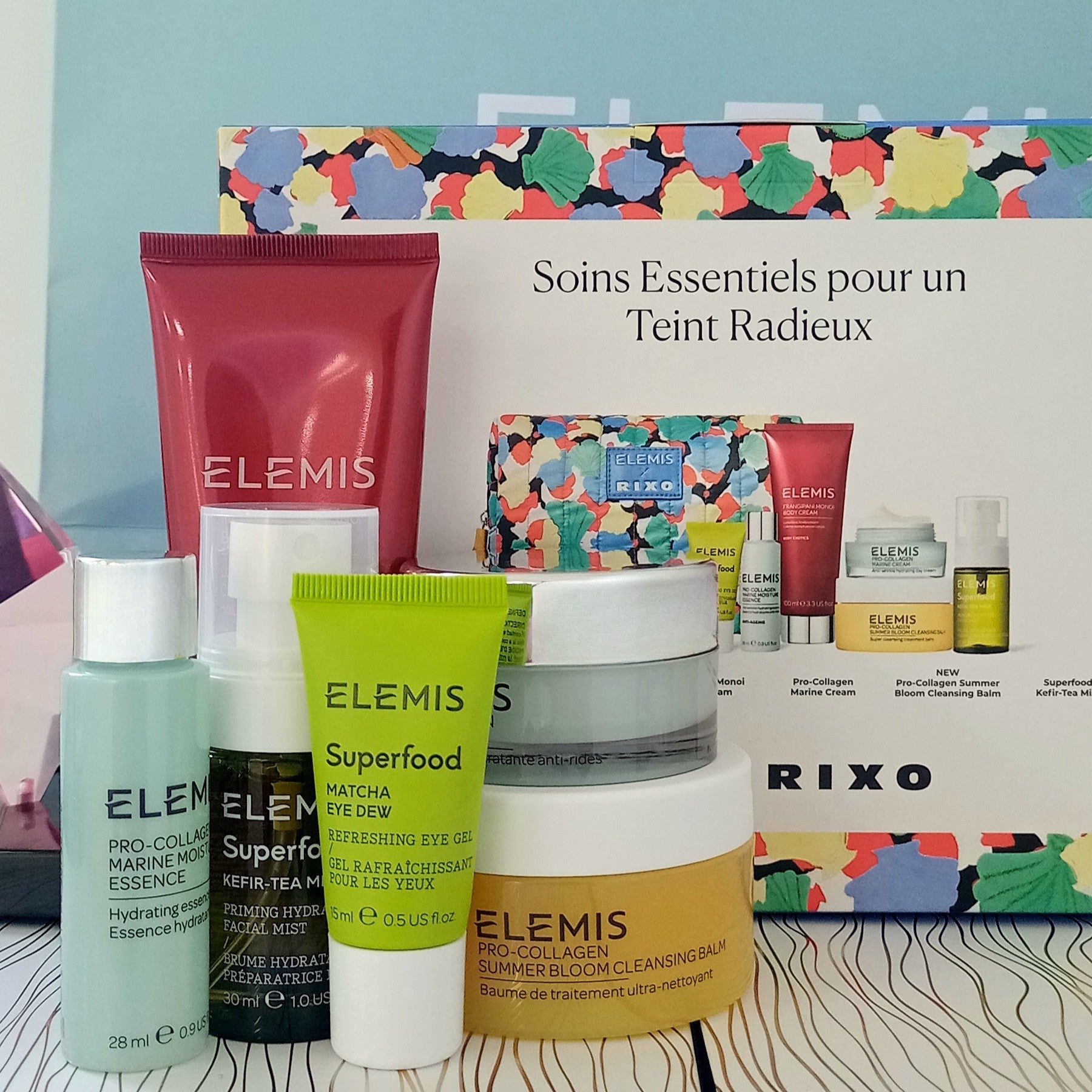 Collection of Elemis skincare products with a colorful box in the background Elegancia Cyprus trnc 